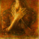 abstract self care image of woman with hands over heart